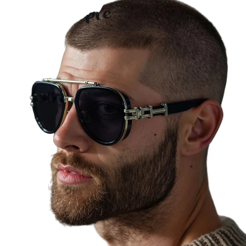 Man wearing a stylish pair of sunglasses with a neutral background