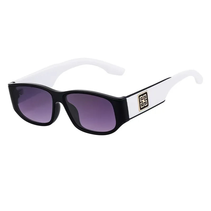Black sunglasses with purple lenses on a white background