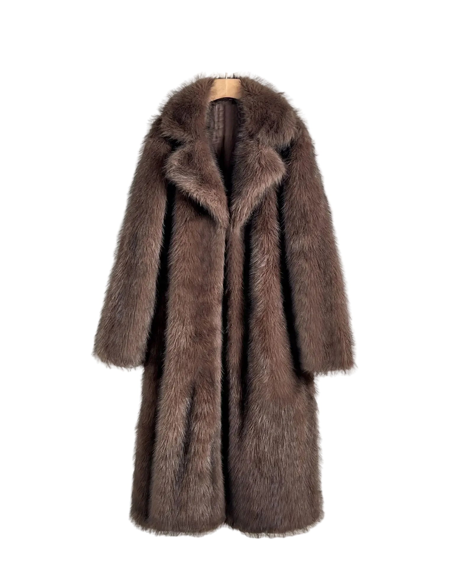 Brown fur coat hanging on a hook against a white wall.