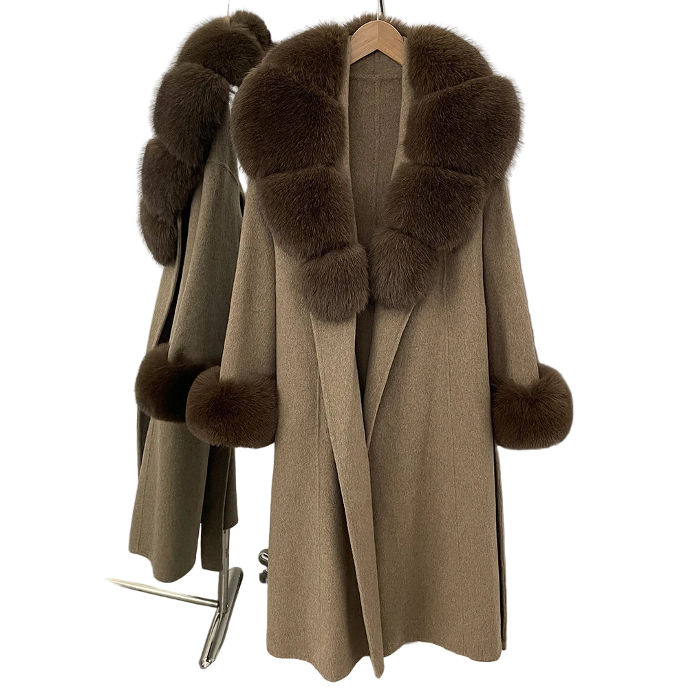 Brown coat with fur accents on a hanger against a white background