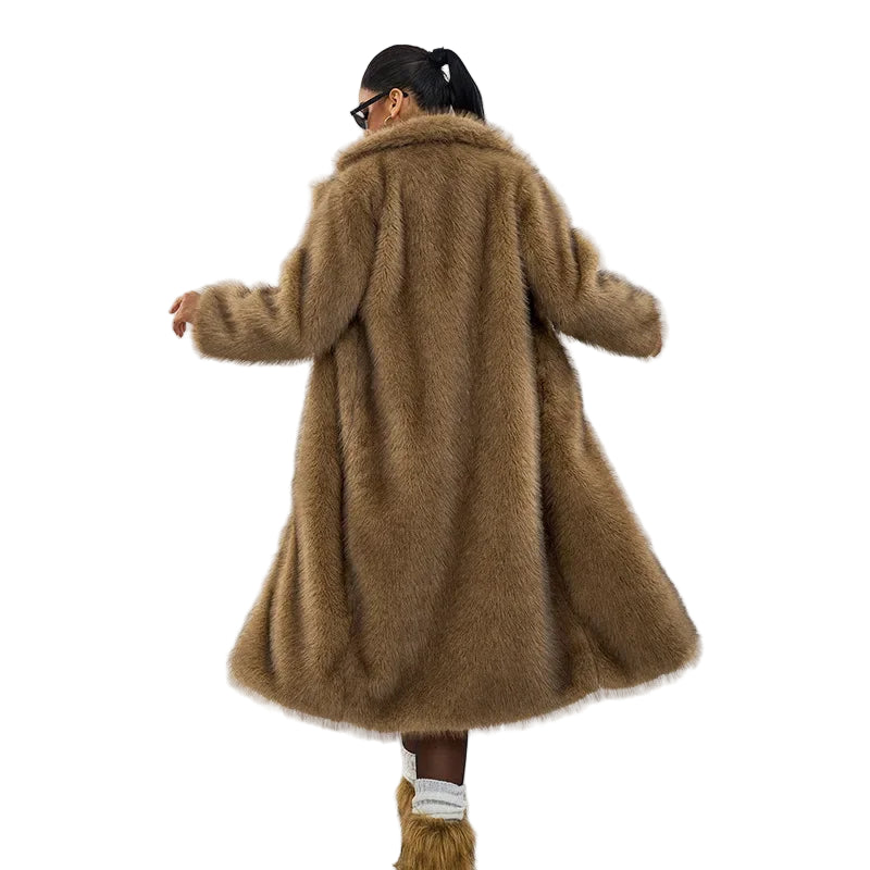 Person wearing a long brown fur coat on a white background