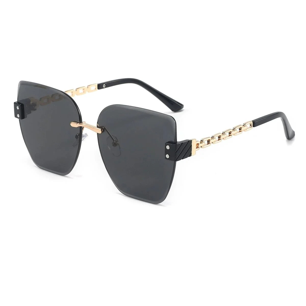 Sunglasses with black lenses and gold frames on a white background